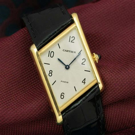 cartier tank asymetrique.